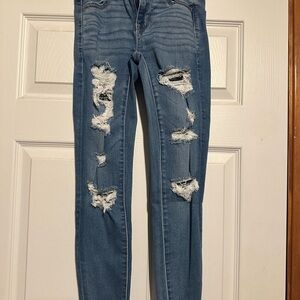 High waisted skinny ripped jeans